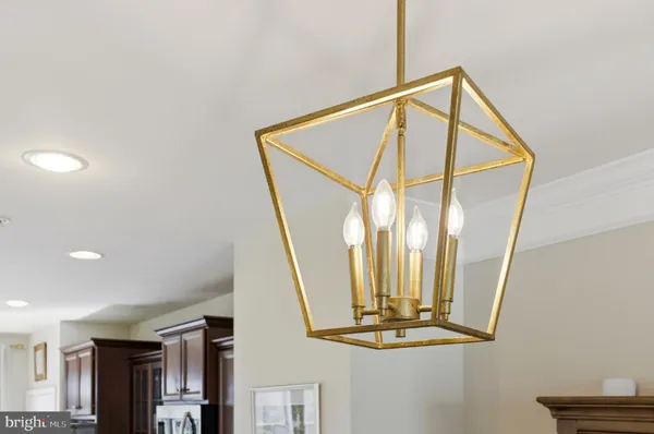 a view of staircase with railing and a painting