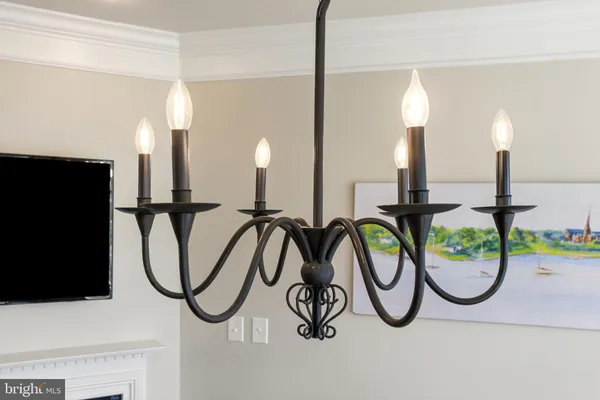 a view of a roof deck with table and chairs a barbeque with wooden floor and fence