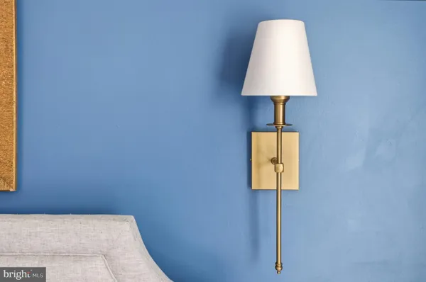 a spacious bathroom with a double vanity sink and a mirror