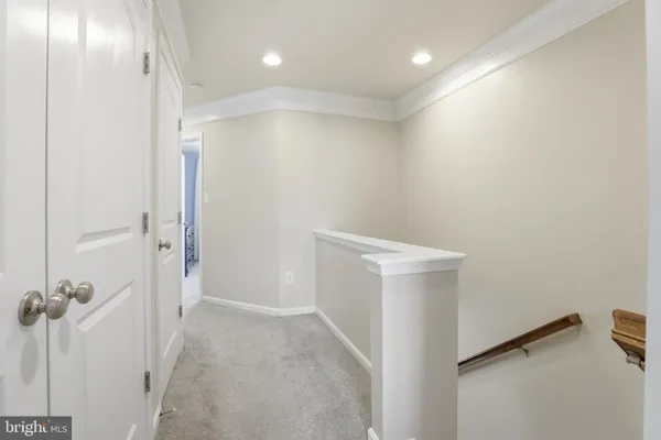 a bedroom with furniture and a chandelier