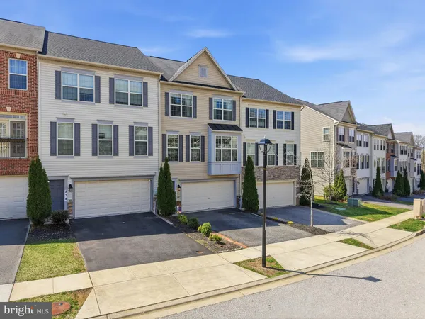a front view of a house with street