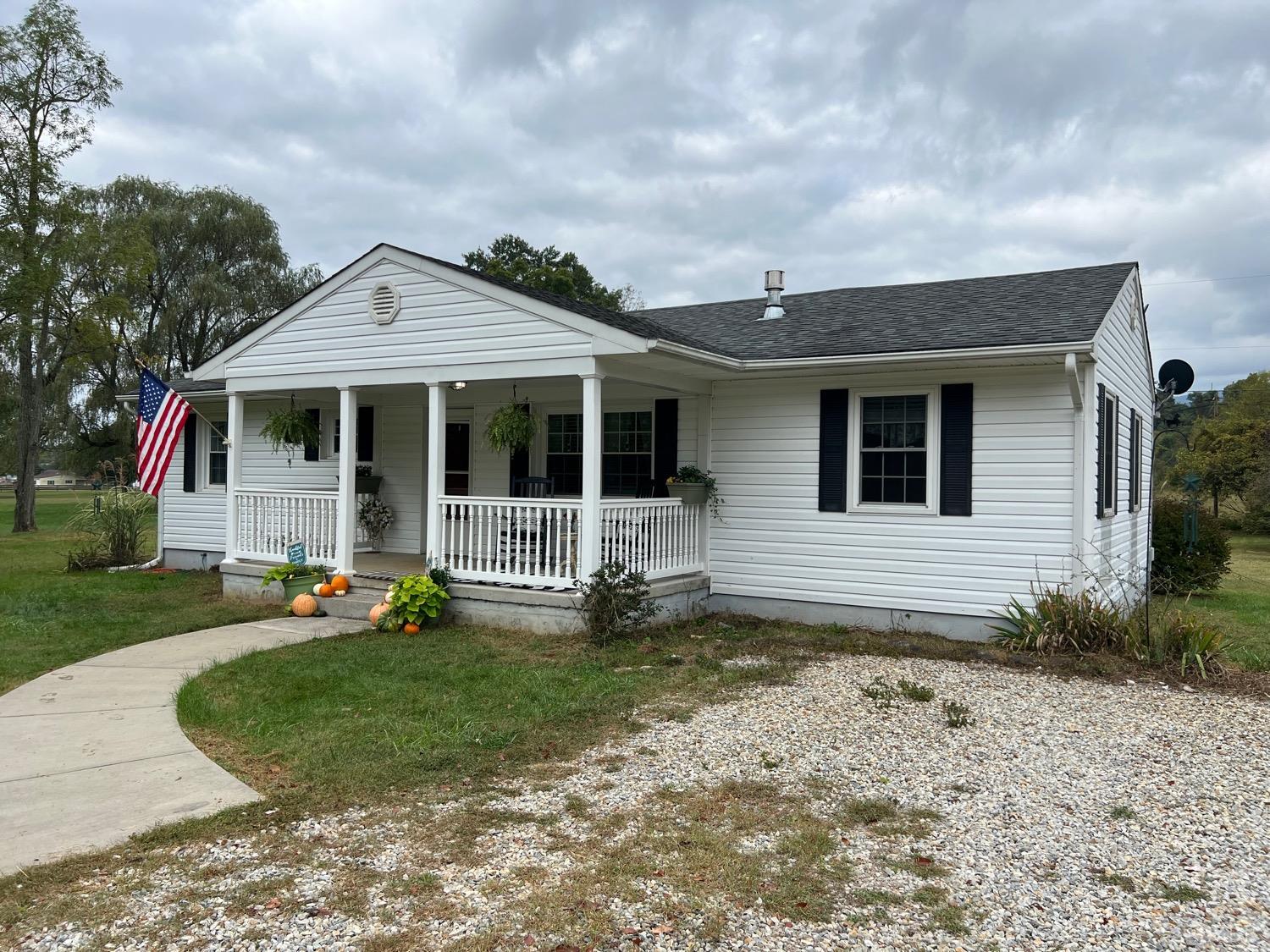 857 Woodson Road Roseland, VA 22967 - Photo 1 of 31 a front view of a house with a yard
