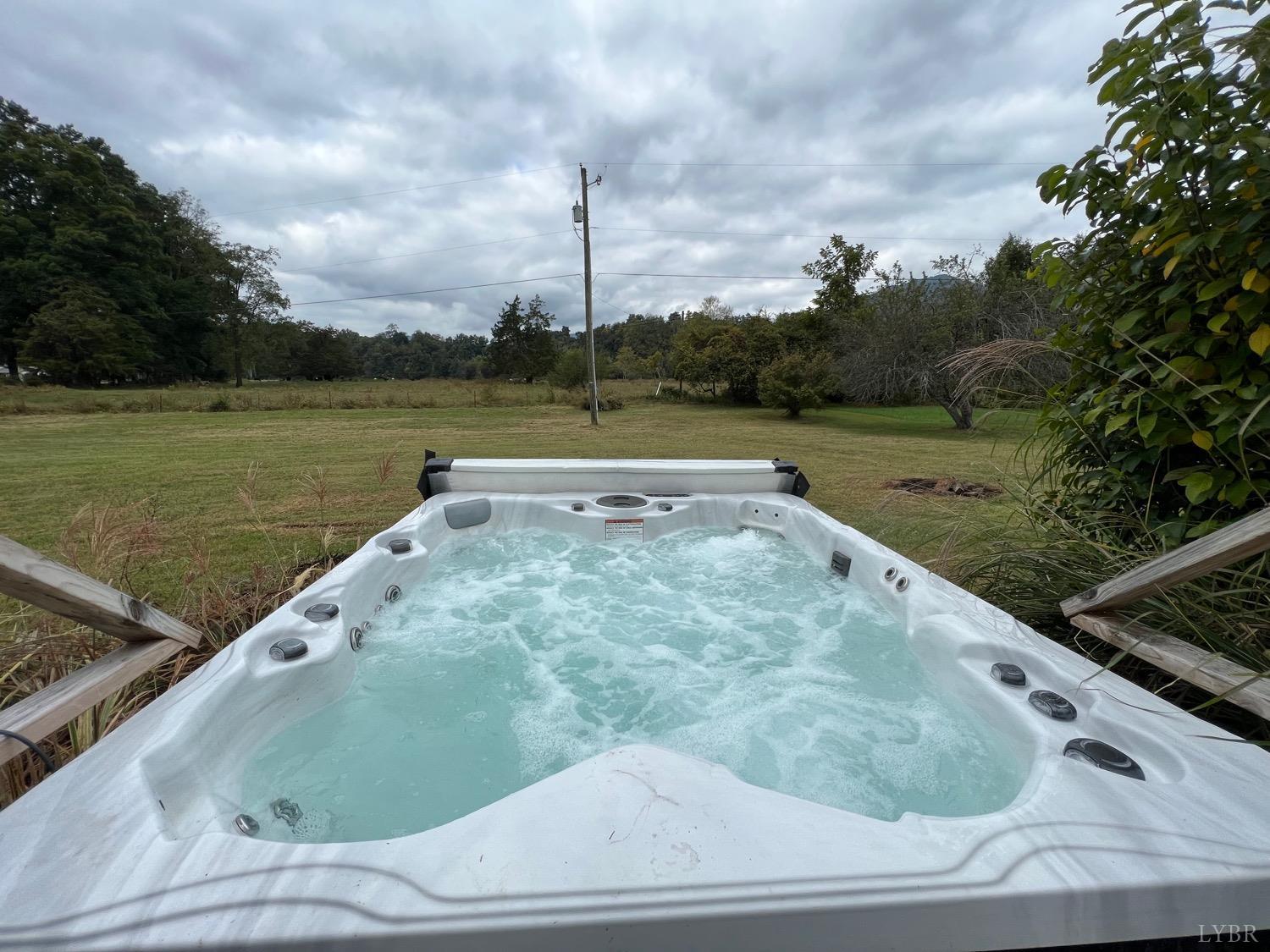 857 Woodson Road Roseland, VA 22967 - Photo 21 of 31 a view of a swimming pool with a yard