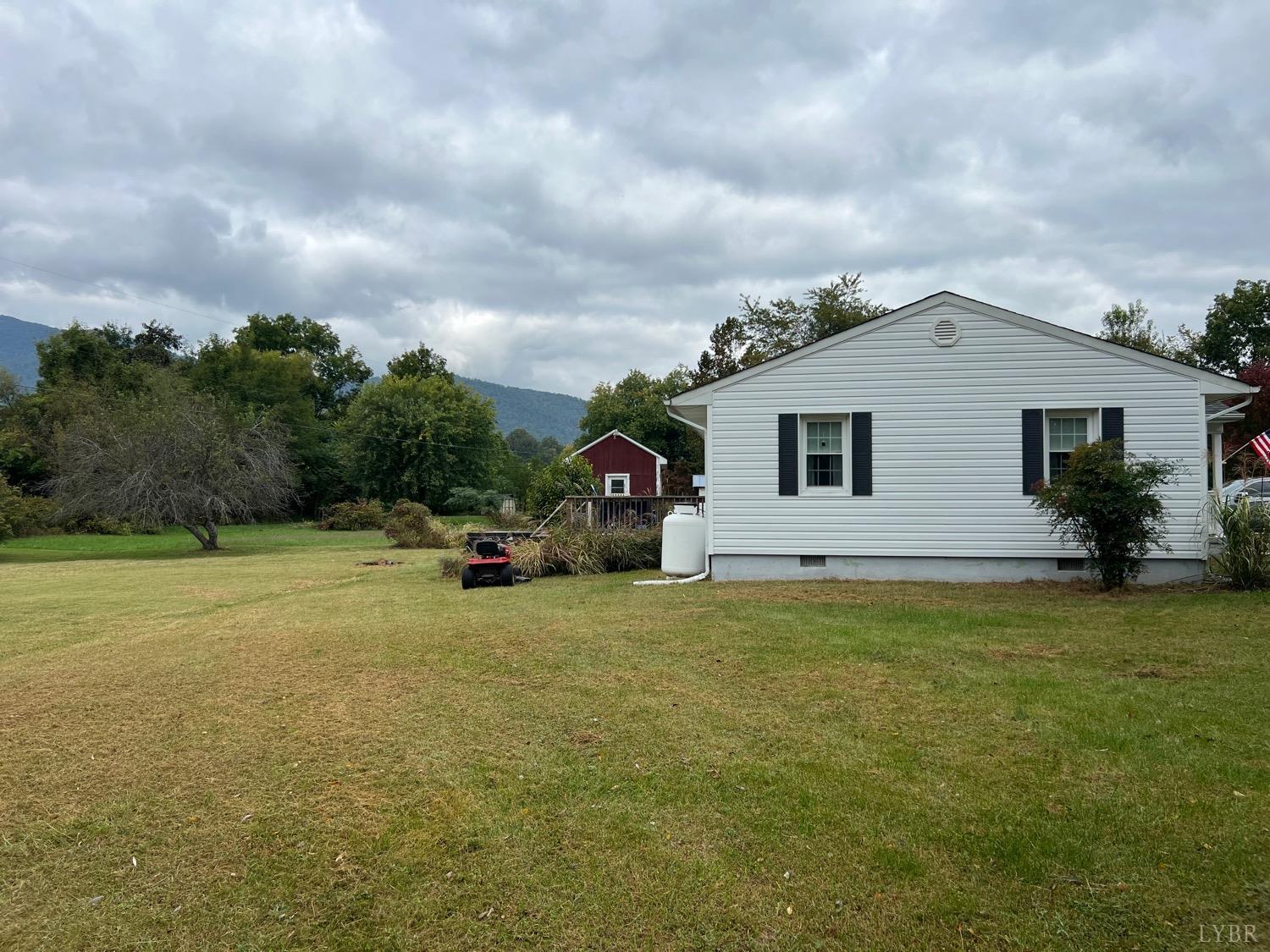 857 Woodson Road Roseland, VA 22967 - Photo 26 of 31 a view of a house with backyard and garden