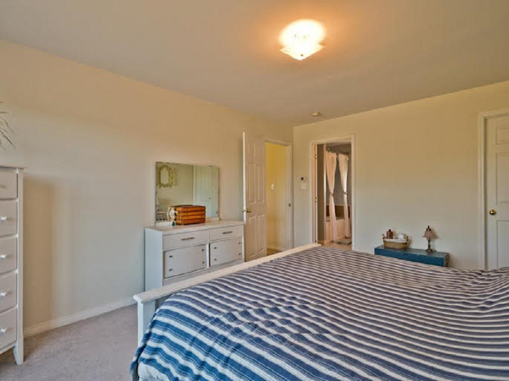 13 Montgomery Road Windham, ME 04062 - Photo 16 of 26 Master bedroom with bathroom and...