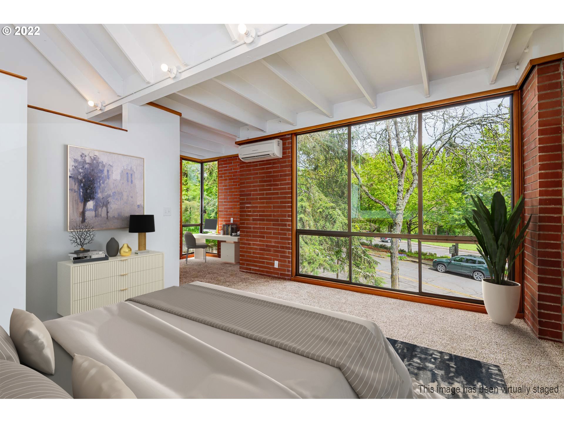 110 High Street Eugene, OR 97401 - Photo 12 of 25 a bedroom with a large bed and a large window