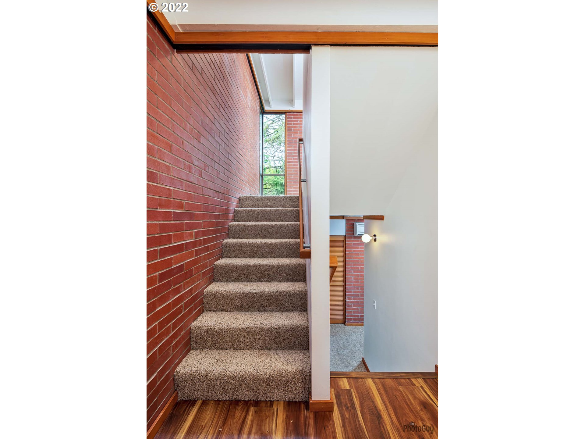 110 High Street Eugene, OR 97401 - Photo 19 of 25 a view of a hallway with wooden floor and entryway