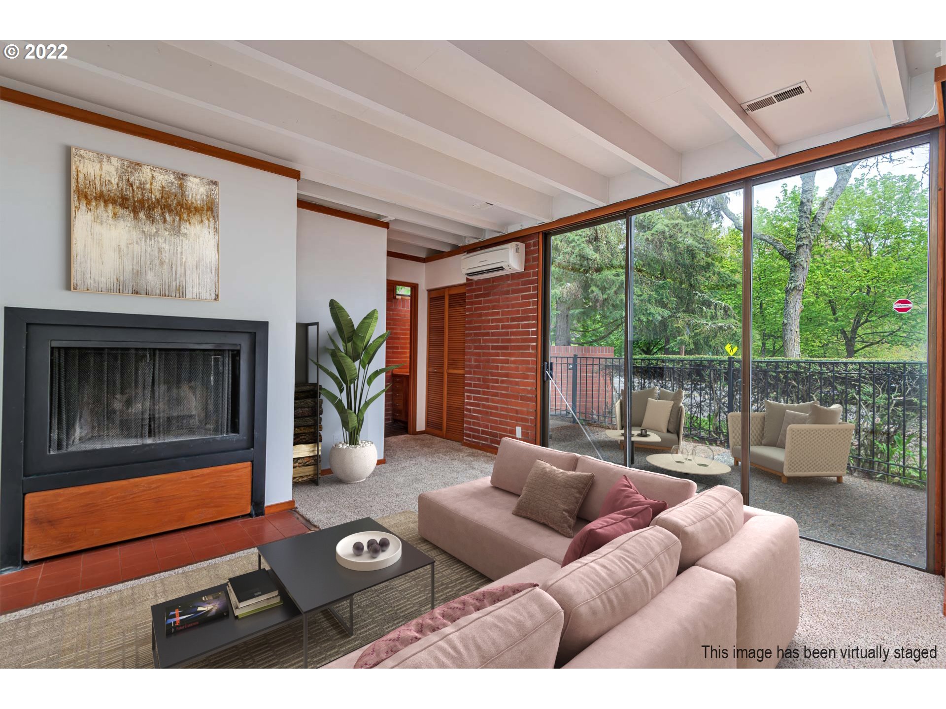 110 High Street Eugene, OR 97401 - Photo 3 of 25 a living room with furniture a window and a fireplace