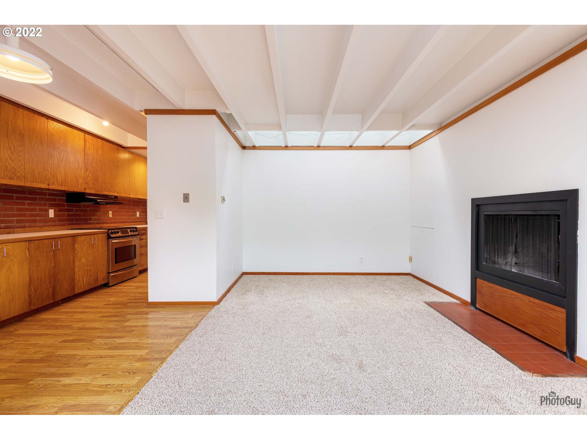 110 High Street Eugene, OR 97401 - Photo 7 of 25 a view interior of a house an empty space and a window