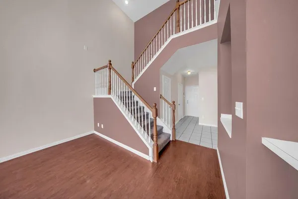 a view of a hallway with staircase