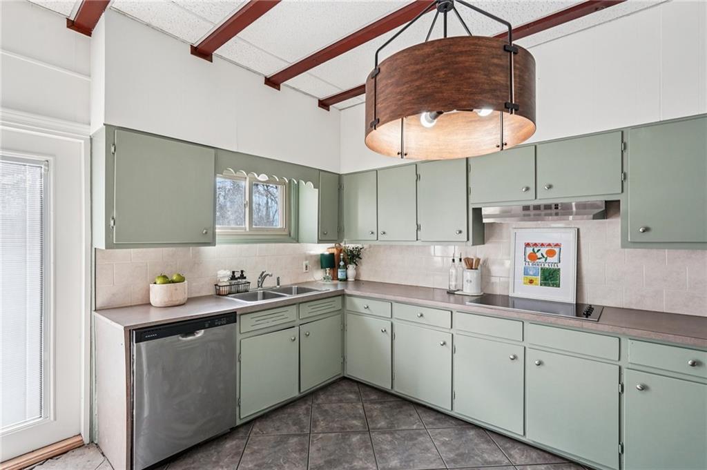 2226 Whites Mill Road Decatur, GA 30032 - Photo 19 of 51 a kitchen with a sink cabinets and window