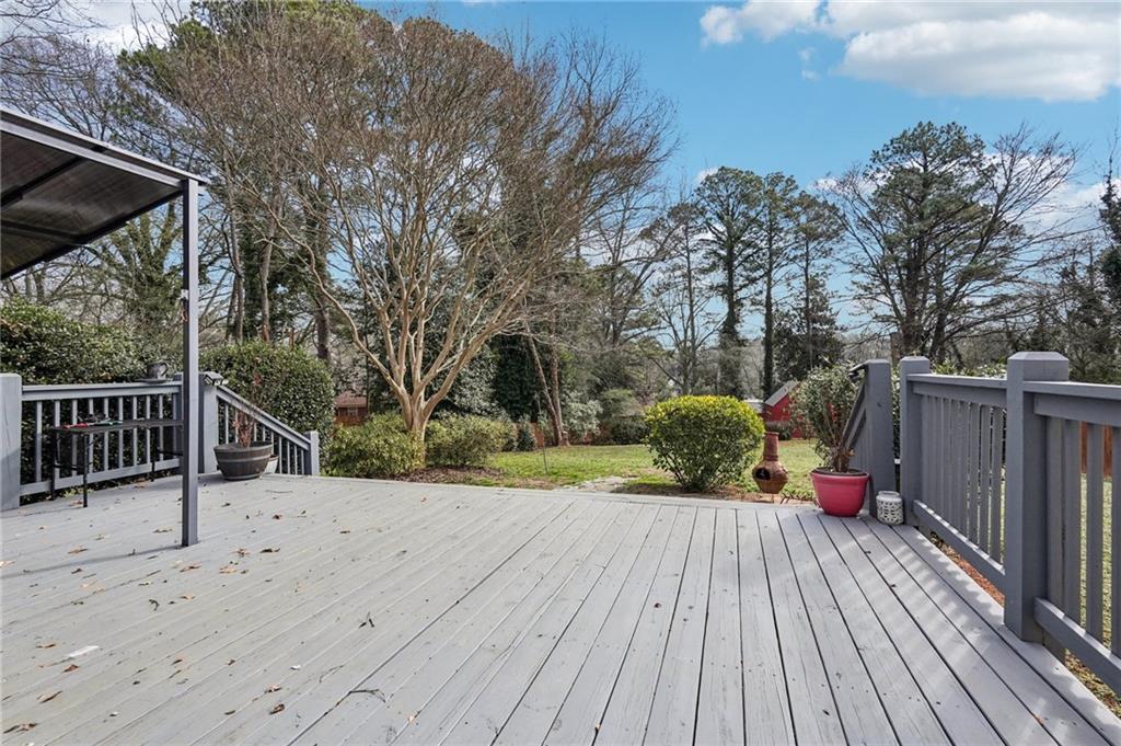 2226 Whites Mill Road Decatur, GA 30032 - Photo 31 of 51 a view of outdoor space with wooden floor and trees