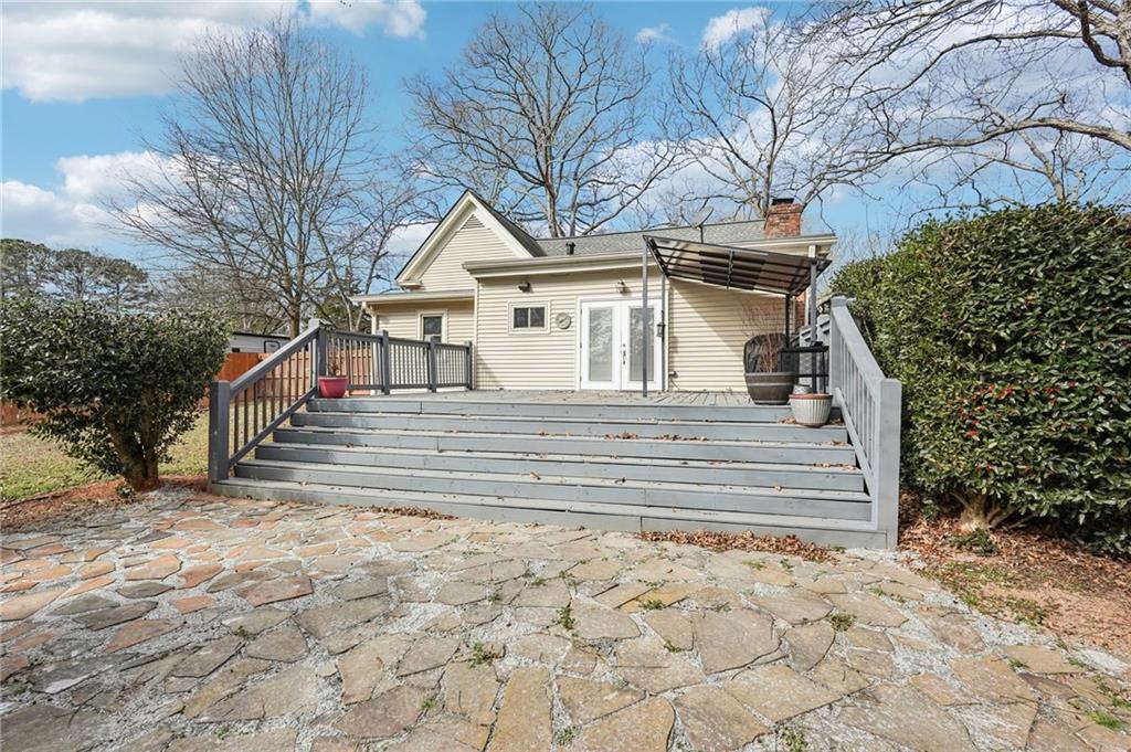 2226 Whites Mill Road Decatur, GA 30032 - Photo 32 of 51 a view of a house with a yard