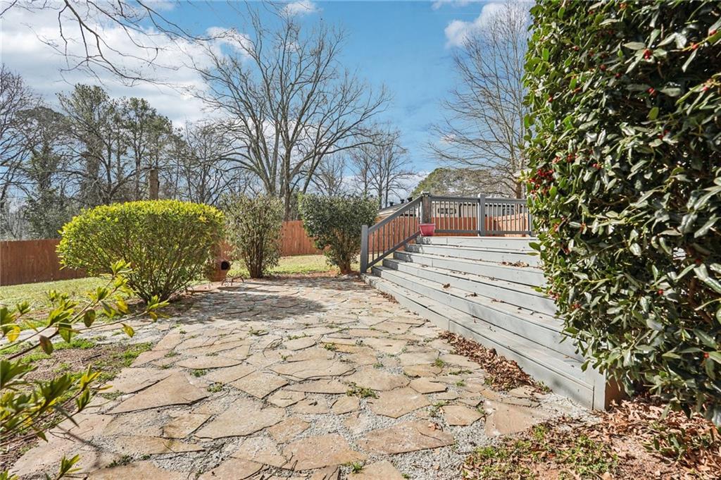 2226 Whites Mill Road Decatur, GA 30032 - Photo 38 of 51 a view of a yard with plants and trees