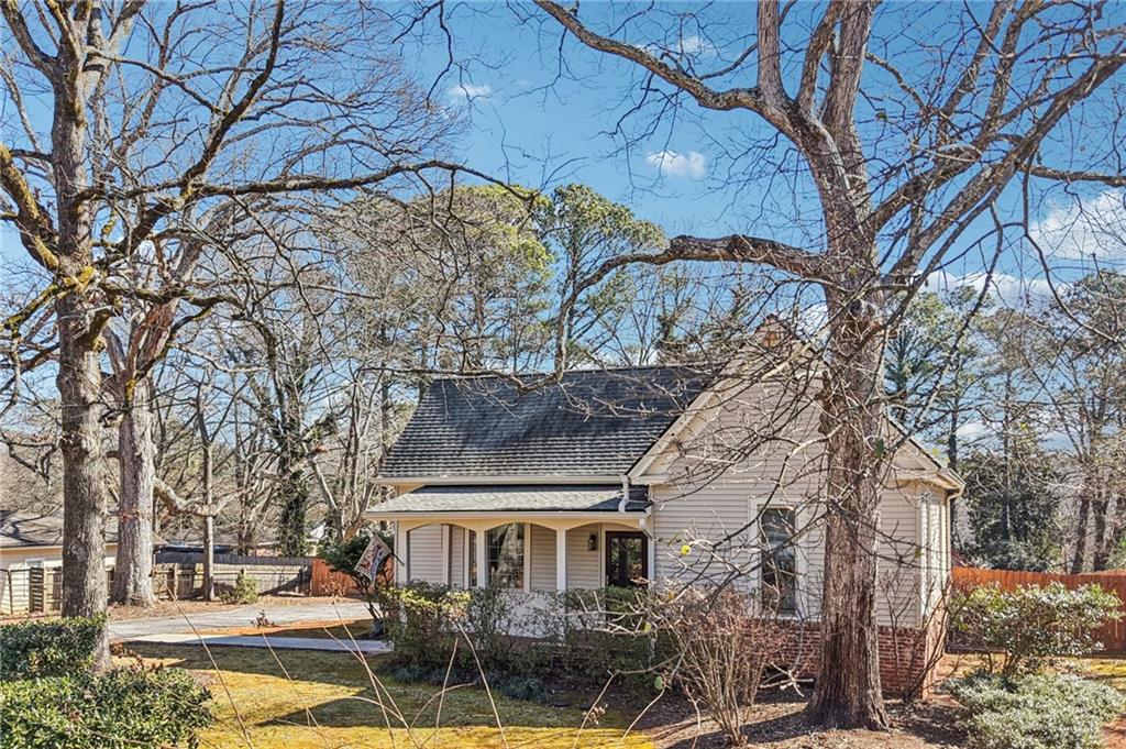 2226 Whites Mill Road Decatur, GA 30032 - Photo 40 of 51 a front view of a building with a yard