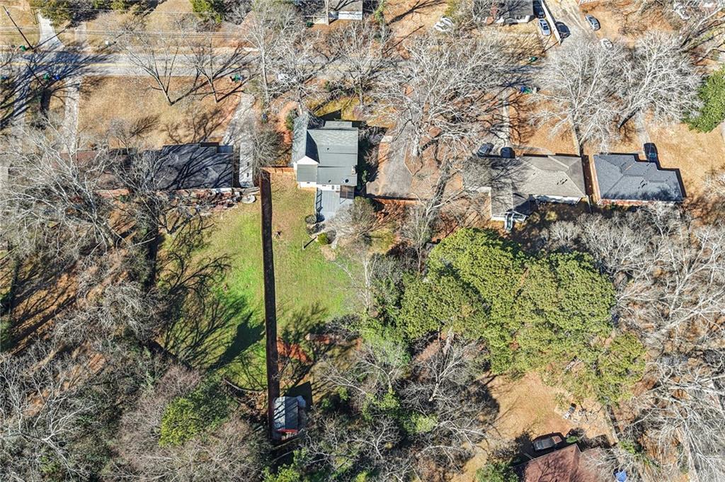 2226 Whites Mill Road Decatur, GA 30032 - Photo 45 of 51 a backyard of a house with lots of green space