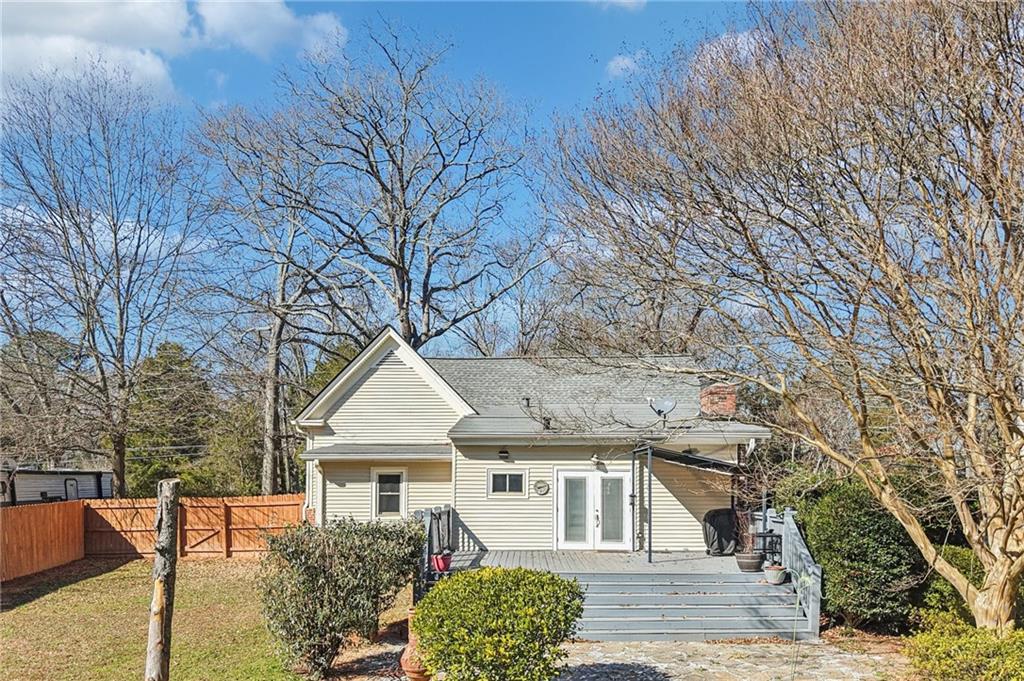 2226 Whites Mill Road Decatur, GA 30032 - Photo 47 of 51 a front view of a house with a yard