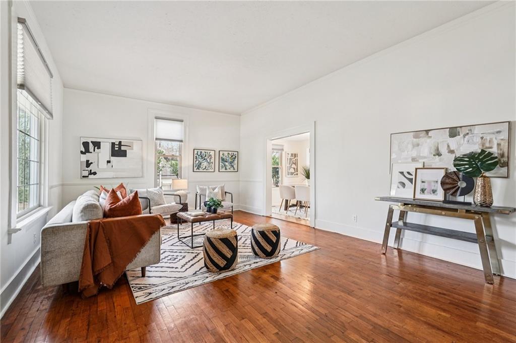 2226 Whites Mill Road Decatur, GA 30032 - Photo 5 of 51 a living room with furniture and a wooden floor