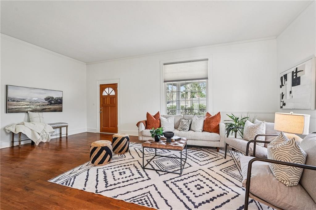 2226 Whites Mill Road Decatur, GA 30032 - Photo 7 of 51 a living room with furniture and a hard wood floor