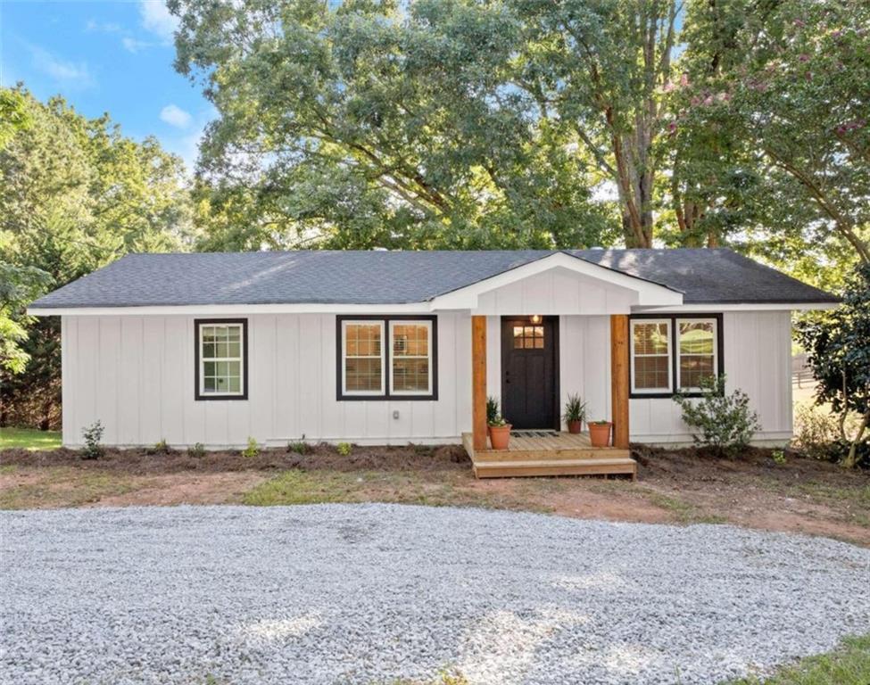 755 Moon Bridge Road Winder, GA 30680 - Photo 1 of 1 front view of a house with yard