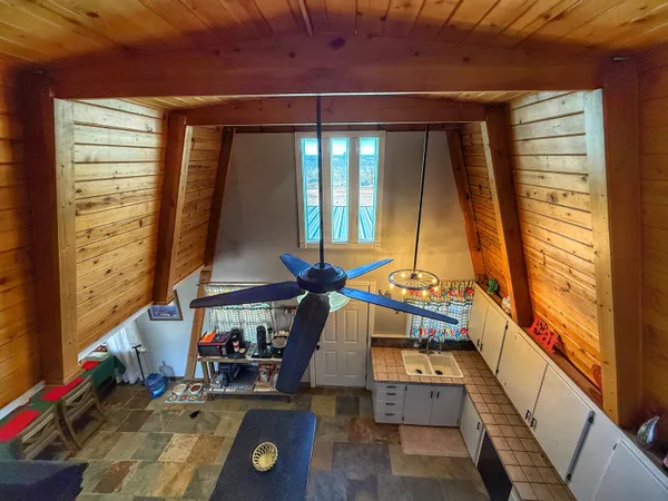 a bedroom with bed and window