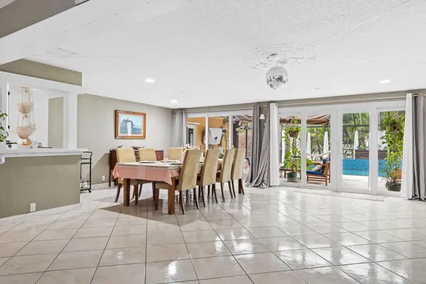 a view of a swimming pool with a porch