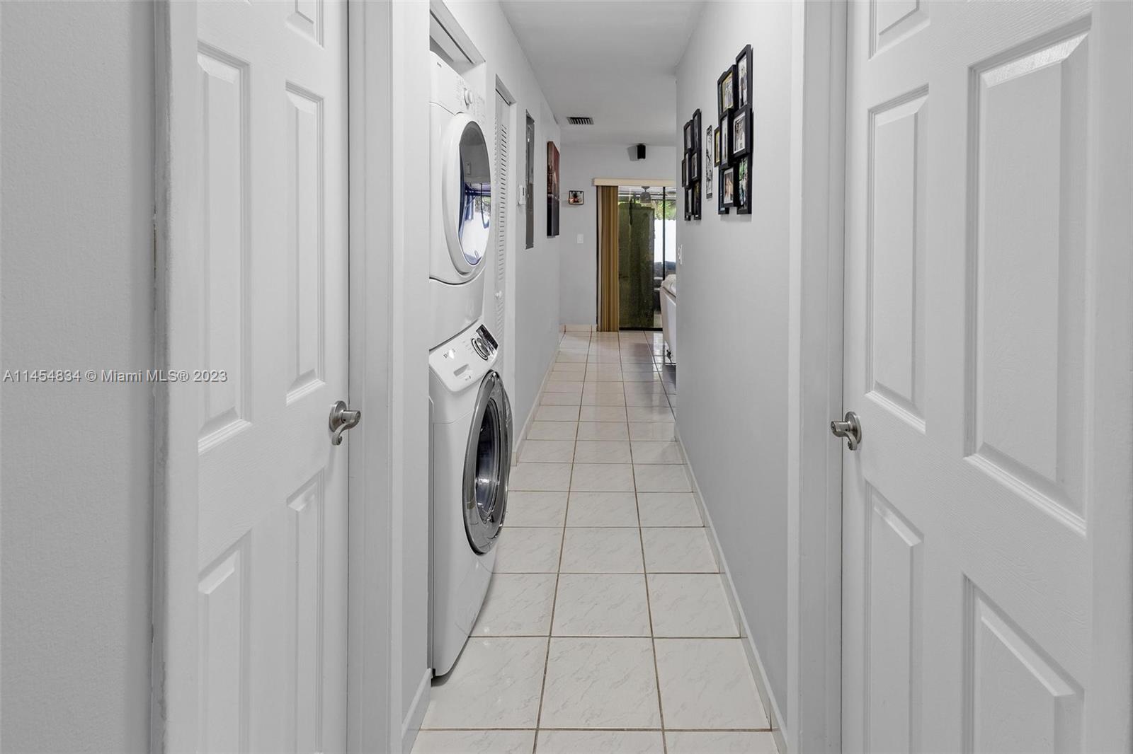 Tamiami Miami, FL 33182 - Photo 15 of 47 a bathroom with a shower and mirror