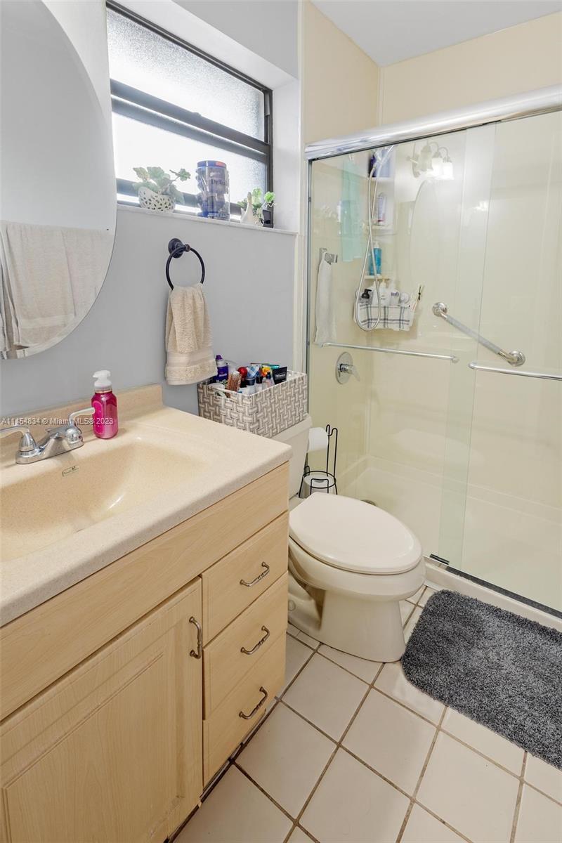 Tamiami Miami, FL 33182 - Photo 28 of 47 a bathroom with a sink toilet and shower