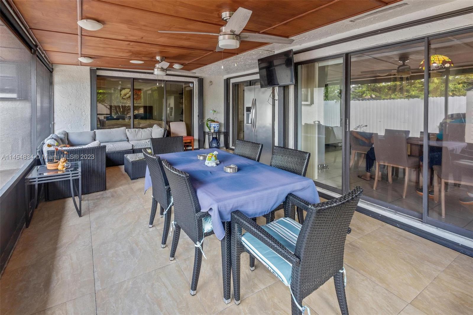 Tamiami Miami, FL 33182 - Photo 30 of 47 a view of a dining room with furniture window and outside view