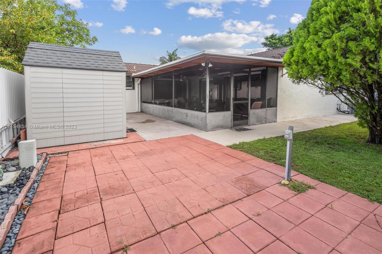 Tamiami Miami, FL 33182 - Photo 39 of 47 a view of house with backyard and garden
