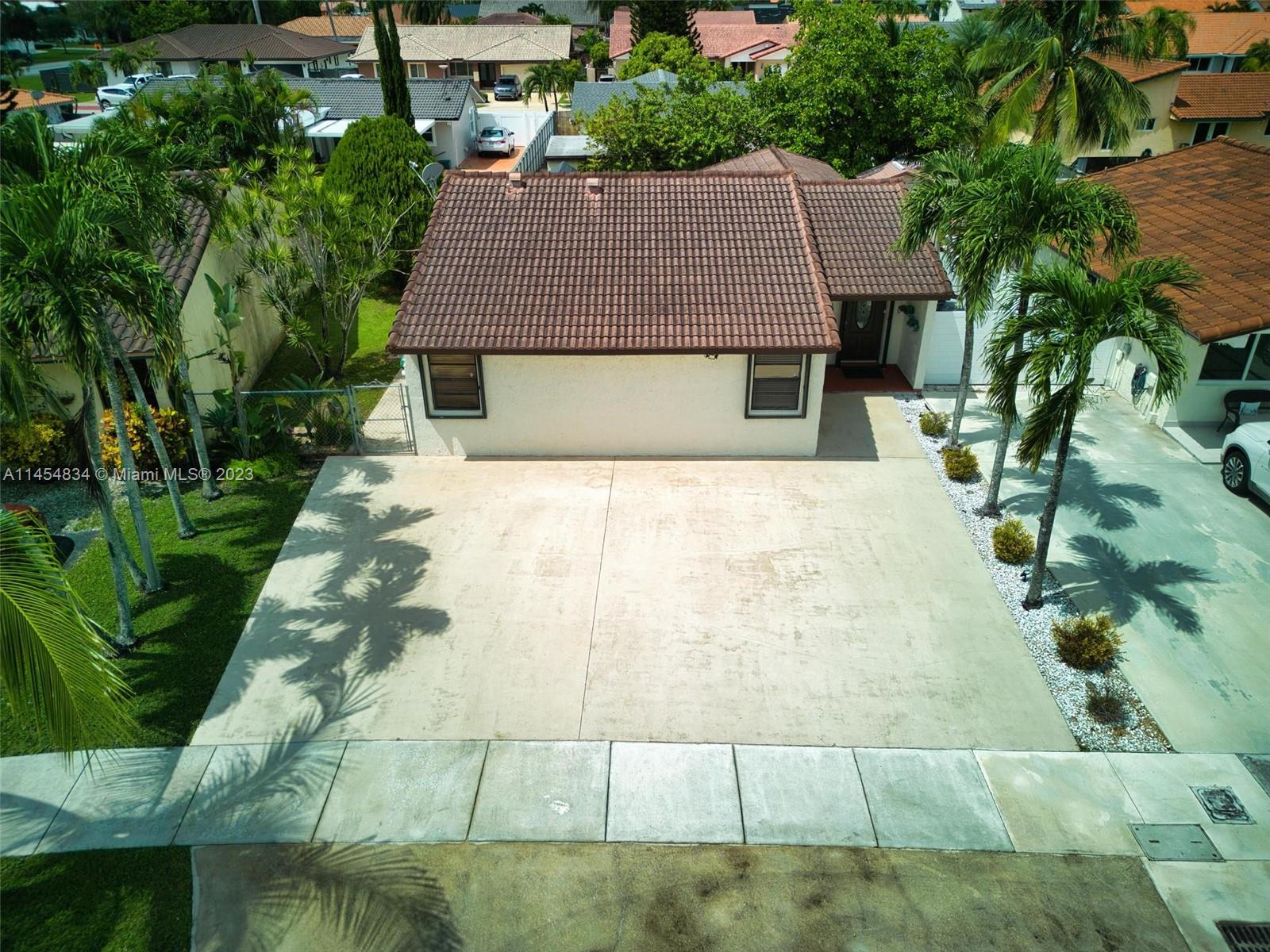 Tamiami Miami, FL 33182 - Photo 43 of 47 a aerial view of a house with yard patio and green space
