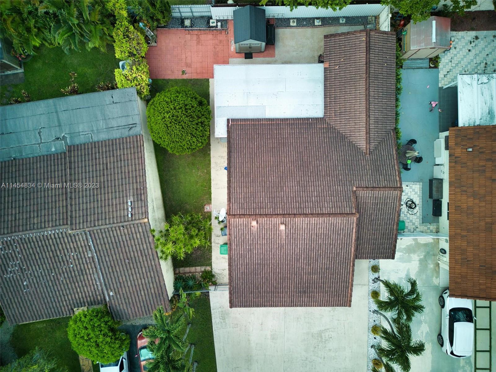 Tamiami Miami, FL 33182 - Photo 44 of 47 an aerial view of a house with a backyard