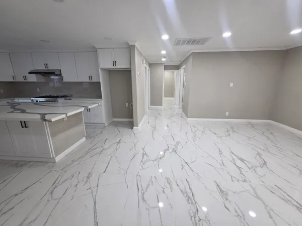 a large kitchen with cabinets