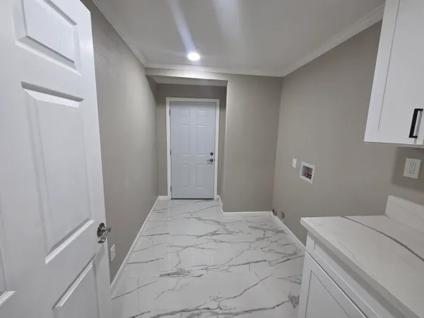 a bedroom with a bed and a cabinets