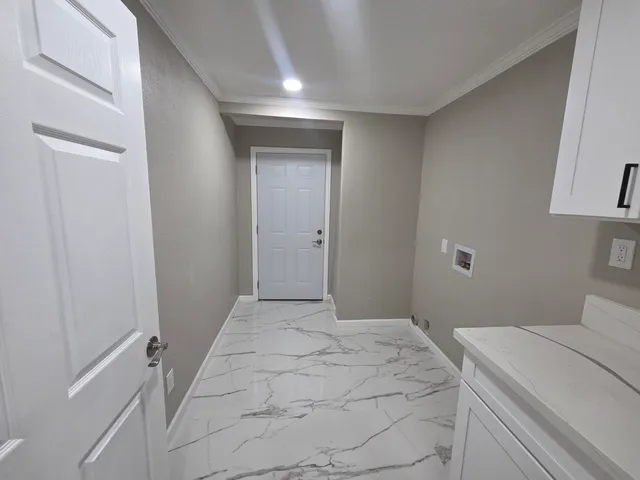 a bedroom with a bed and a cabinets