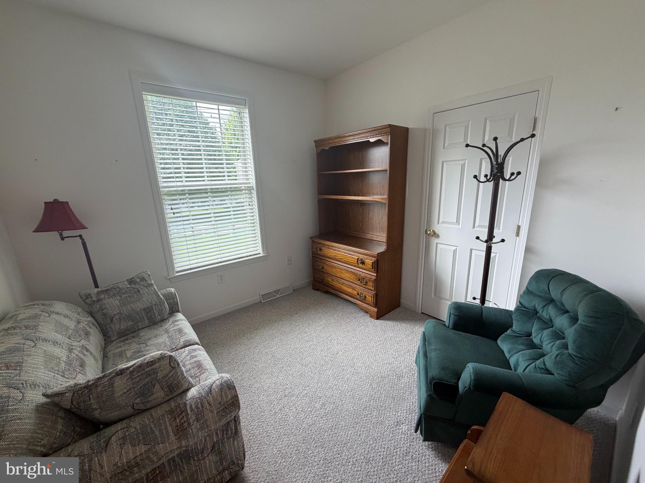 428 Haymarket Lane Lititz, PA 17543 - Photo 10 of 31 a living room with furniture window and a flat screen tv