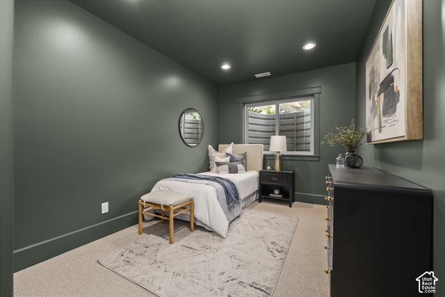 1175 North Elk Rdg Lane, Unit 201 Alpine, UT 84004 - Photo 36 of 38 Recessed lighting illuminates a space featuring a window with a well-cover, carpet flooring, and dark-toned walls