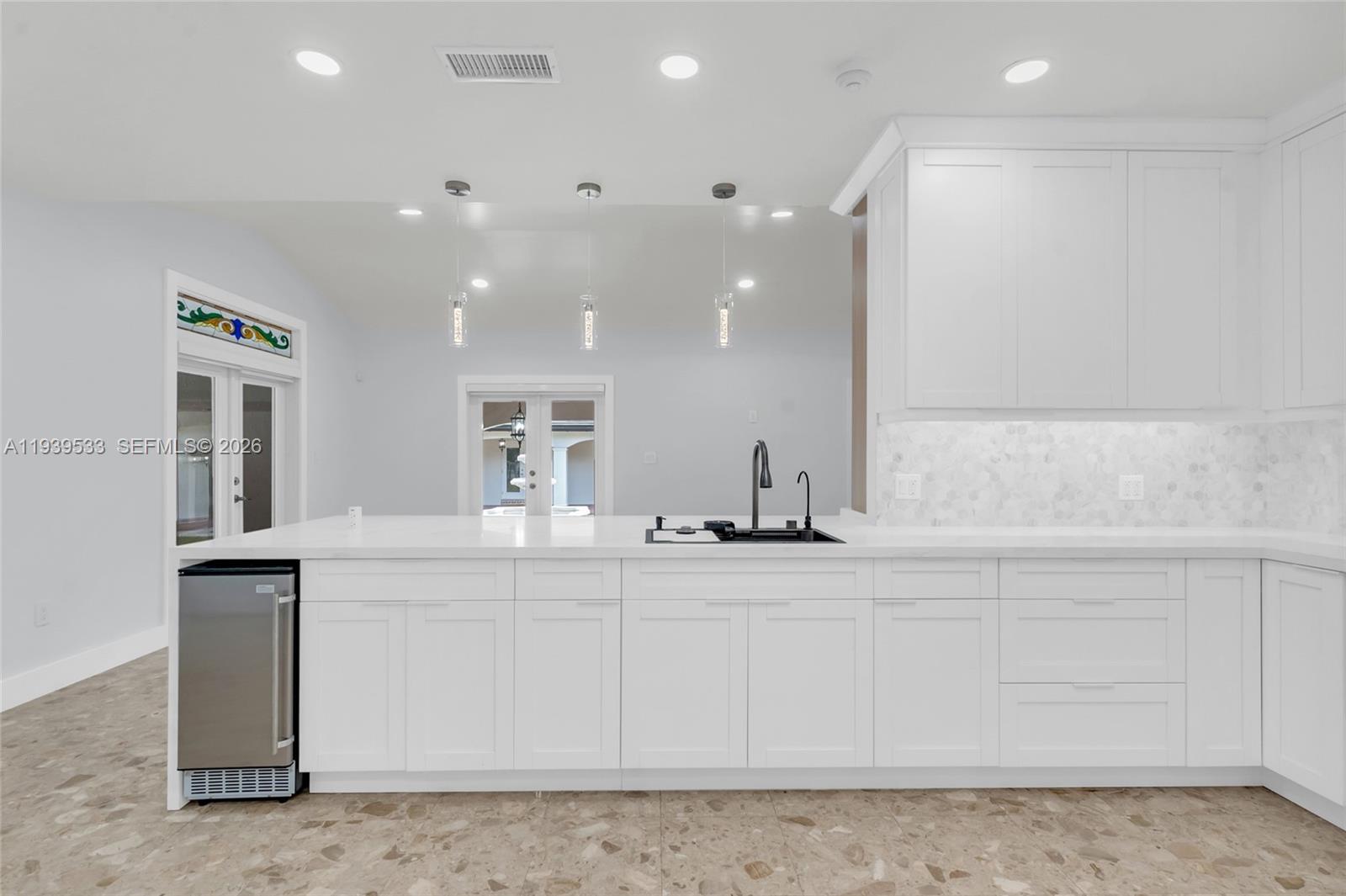 11835 Southwest 47th Street Miami, FL 33175 - Photo 25 of 48 a bathroom with a sink and a mirror