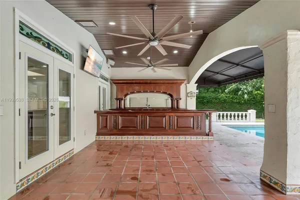 a kitchen with stainless steel appliances granite countertop a stove and a cabinets