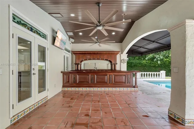 a kitchen with stainless steel appliances granite countertop a stove and a cabinets