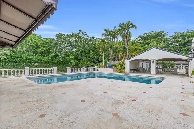 front view of a house with swimming pool