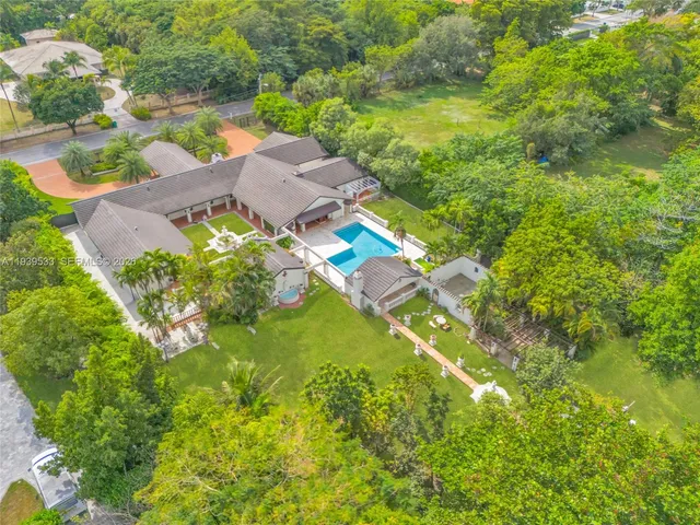 front view of a house with a garden