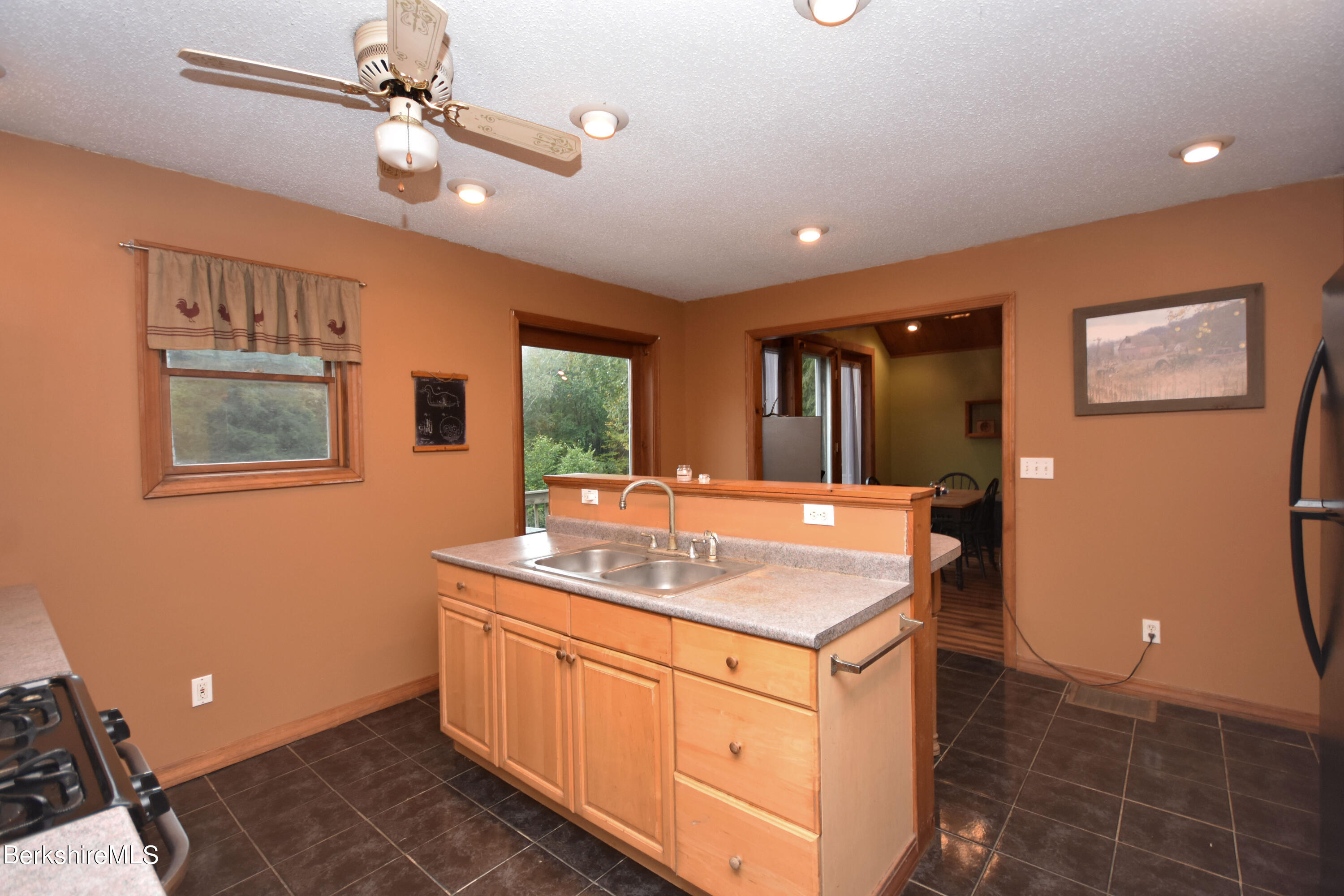 206 Sam Hill Road Worthington, MA 01098 - Photo 14 of 40 a bathroom with a granite countertop sink a mirror and vanity