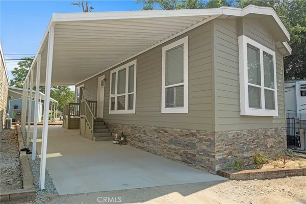 a front view of a house with garage