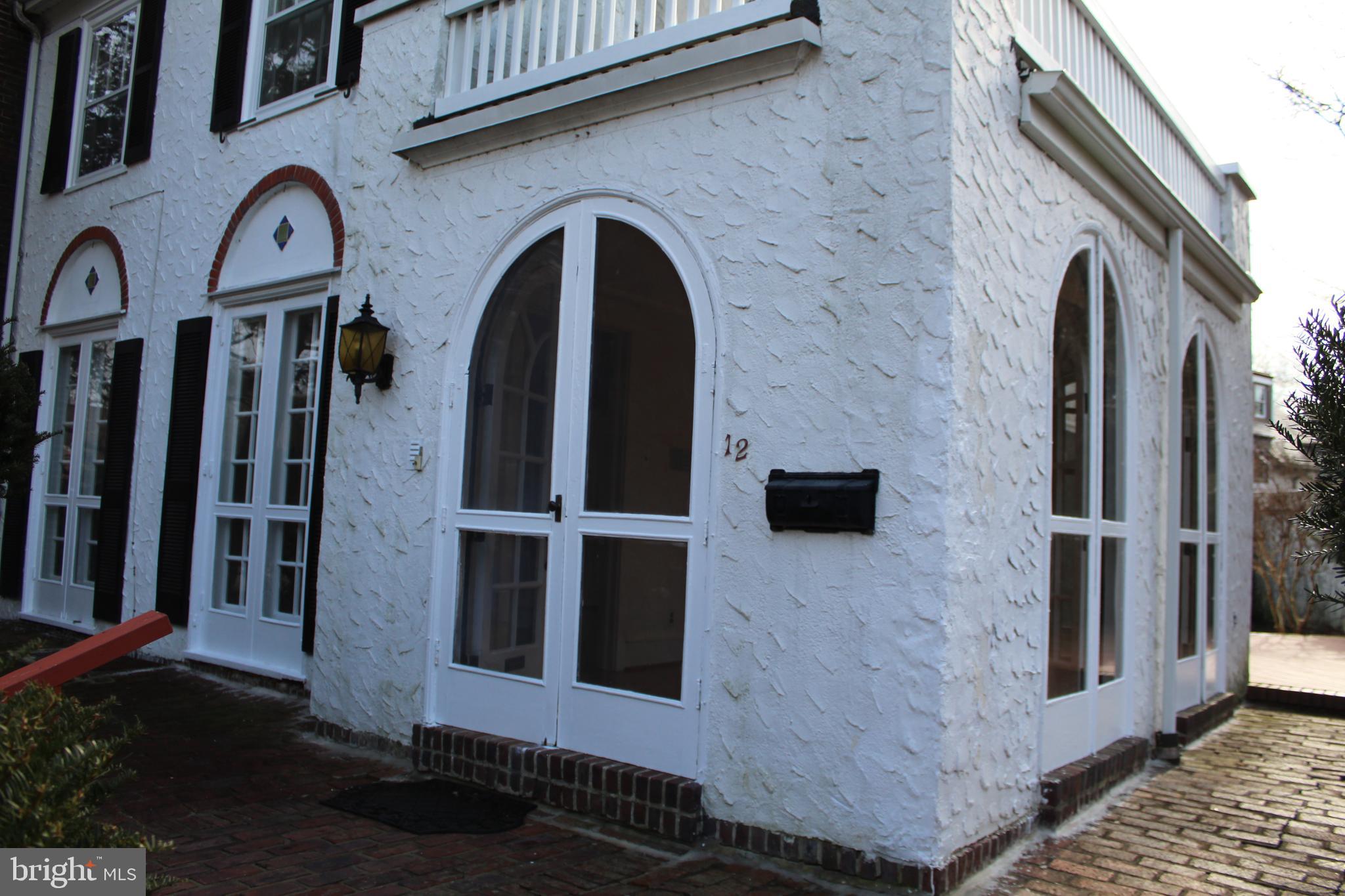 12 Gladstone Road Lansdowne, PA 19050 - Photo 45 of 49 Exterior front and side sunroom french doors