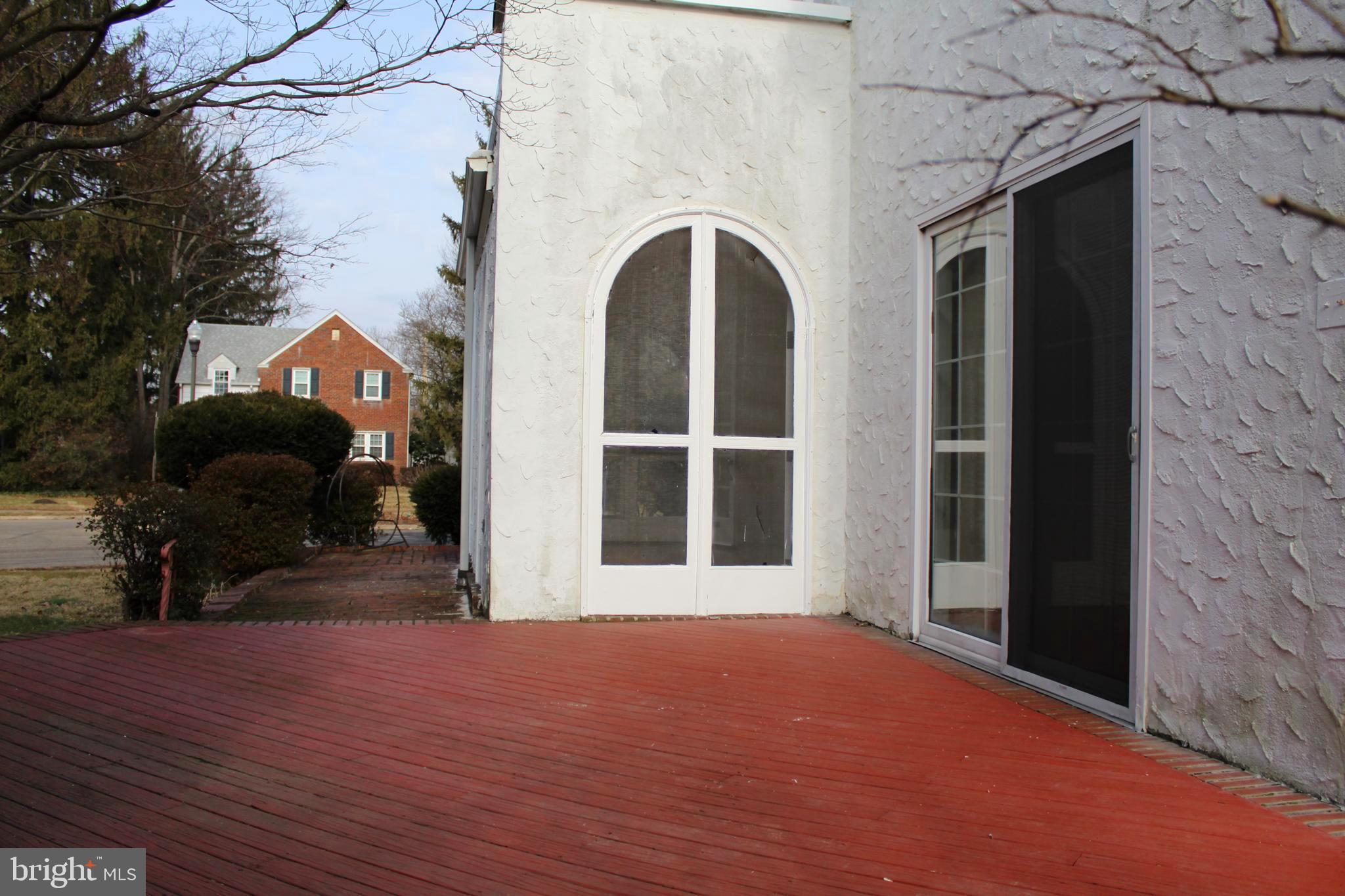 12 Gladstone Road Lansdowne, PA 19050 - Photo 46 of 49 Back sunroom french door / dining room / deck