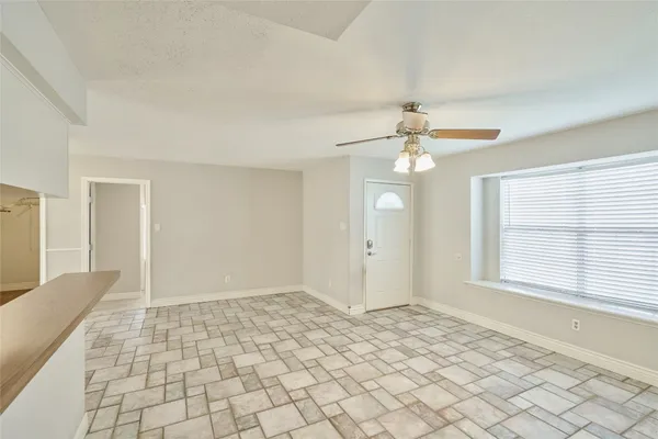 a view of an empty room with window