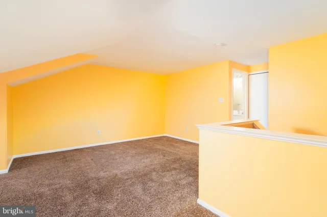 a view of a room with a window