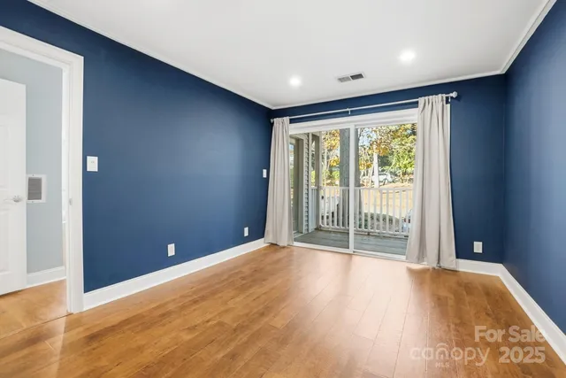 wooden floor and windows in an empty room