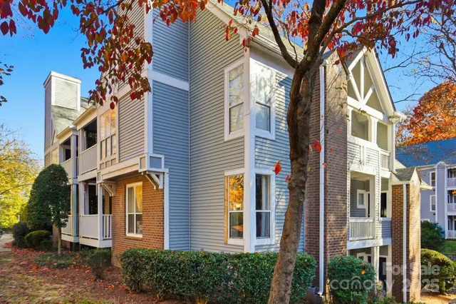 a view of a building with a tree